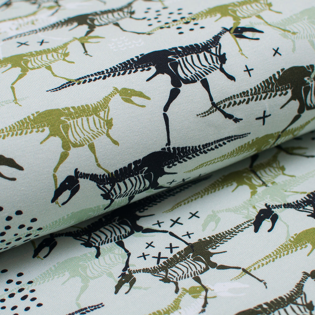 Tissu en ligne Québec french terry de coton lycra motif de fossile de dinosaure. Online fabric cotton spandex french terry knit with dinosaur fossil.