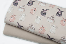 Tissu en ligne Québec jersey de coton lycra motif de lapins parfait pour Paques. Online fabric cotton spandex jersey knit with bunnies perfect for easter.