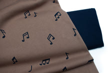 Tissu en ligne Québec coton ouaté avec motif de note de musique. Online fabric store hooded cotton sweat with music note.