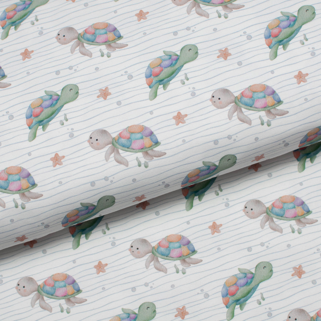 Tissu en ligne Québec jersey de coton lycra motif de tortue. Online fabric store cotton spandex jersey knit with turtle.