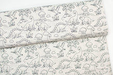 Tissu en ligne Québec popeline 100% coton tissé avec motif de dinosaures à colorier. Online fabric 100% cotton poplin with dinosaur to coloring.