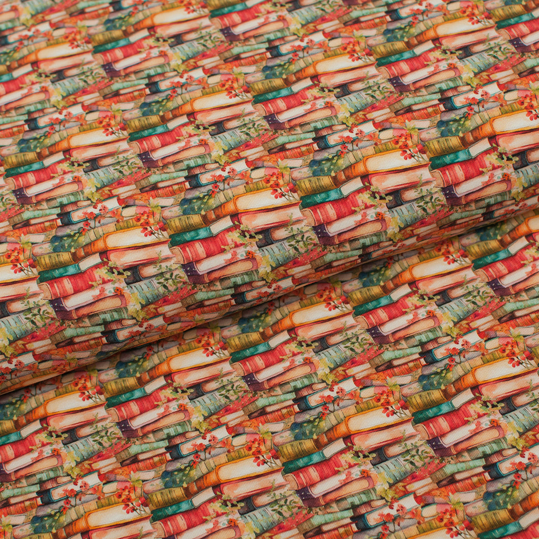 Tissu en ligne jersey de coton lycra motif de livres. Online fabric cotton spandex jersey knit with book.