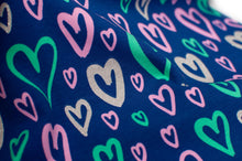 Tissu en ligne Québec jersey de coton lycra motif de coeur. Oneline fabric store cotton spandex jersey knit with hearts.