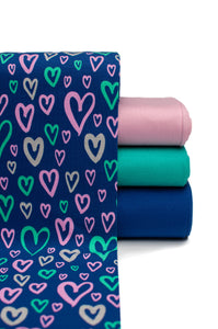 Tissu en ligne Québec jersey de coton lycra motif de coeur. Oneline fabric store cotton spandex jersey knit with hearts.