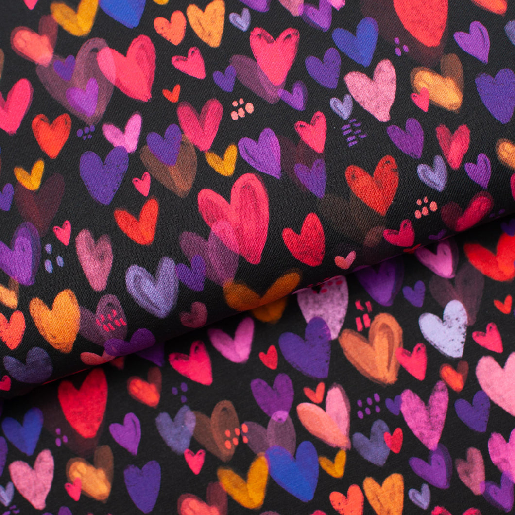 Tissu en ligne Québec jersey de coton lycra motif de coeurs. Online fabric cotton spandex jersey knit with hearts.