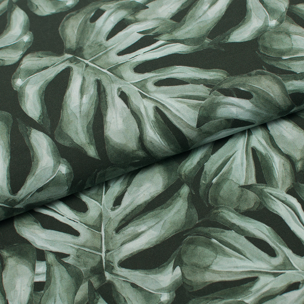 Tissu en ligne Québec jersey de coton spandex motif de plante monstera. Online fabric store cotton lycra jersey knit with monstera plant.