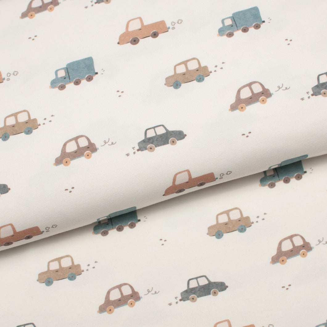 Tissu en ligne Québec jersey de coton lycra motif de petite voiture. Online fabric cotton spandex jersey knit with vehicles.