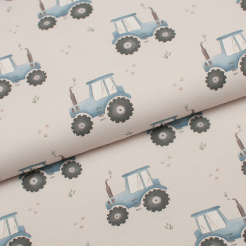 Tissu en ligne Québec jersey de coton lycra motif de tracteur. Online fabric cotton spandex jersey knit with tractor print.