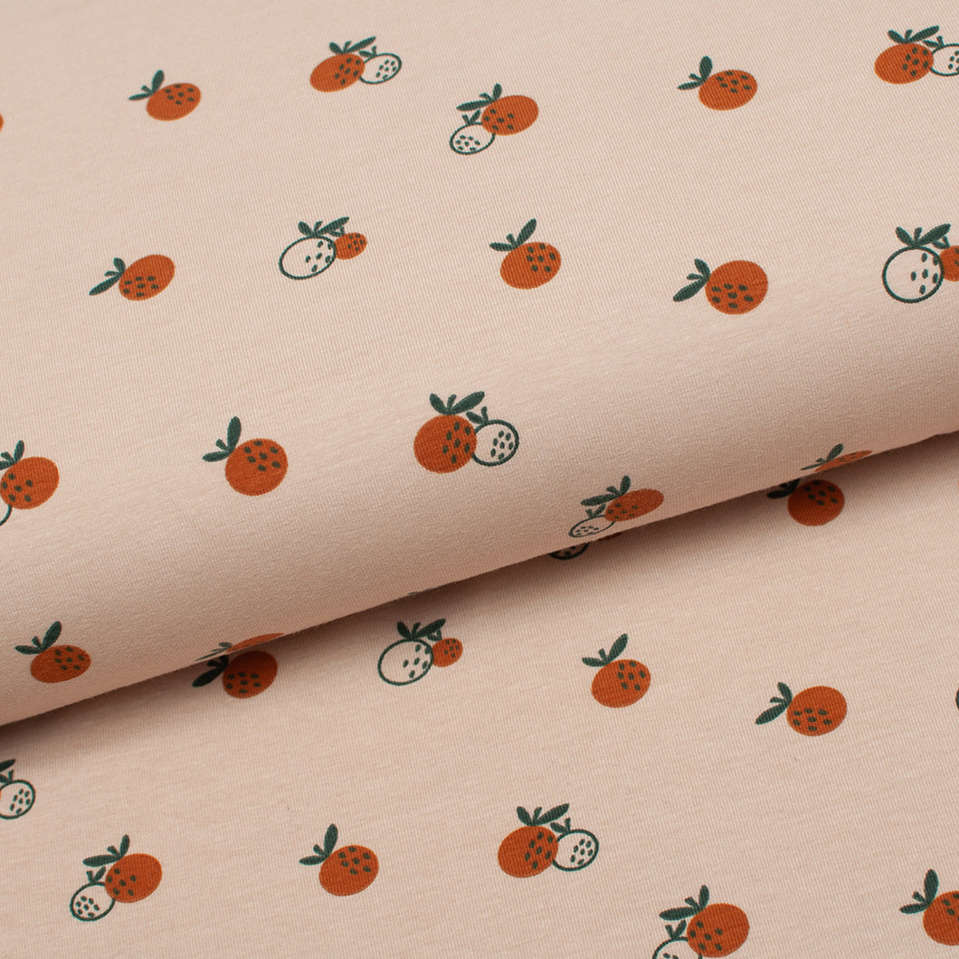 Tissu en ligne Québec jersey de coton lycra motif de fruit orange clémentine. Online fabric cotton spandex jersey knit with orange fruit.