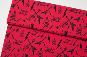 Cotton lycra jersey fabric with music pattern, guitar, rock, skull, punk. Online fabric cotton jersey knit with guitar and skull.