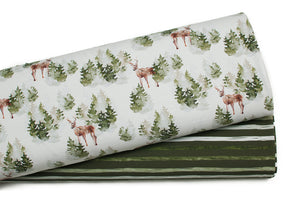 Fabric online Quebec French terry cotton lycra pattern of deer in the forest. Online fabric cotton spandex french terry knit with deer in a forest.
