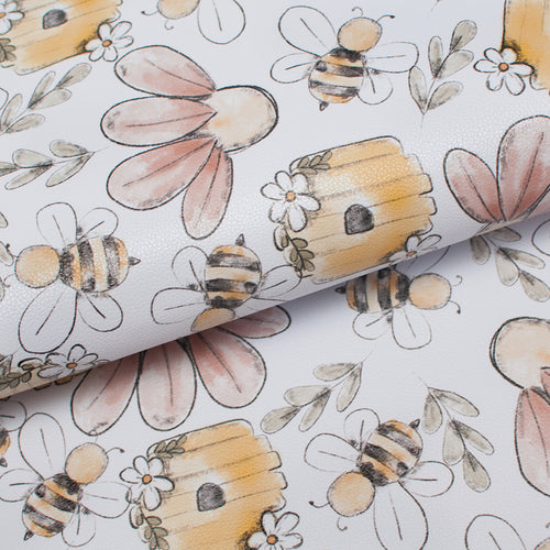 Tissu en ligne similicuir, faux cuir, cuirette avec motif de fleurs et d'abeille. Online fabric leather with bee and flowers.