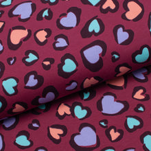 Tissu en ligne Québec french terry brossé coton lycra motif de coeur. Online fabric store sweat brushed cotton spandex french terry with heart.