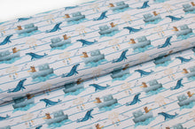 Tissu en ligne Québec jersey de coton lycra motif d'ourson capitaine de bateau et des baleines. Online Canadian fabric store cotton spandex jersey knit with a bear on a boat with whale.