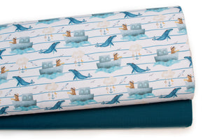 Tissu en ligne Québec jersey de coton lycra motif d'ourson capitaine de bateau et des baleines. Online Canadian fabric store cotton spandex jersey knit with a bear on a boat with whale.