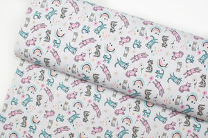 Shiny lycra cotton jersey line fabric with cat and rainbow patterns. Online fabric cotton spandex glitter jersey knit with cat and rainbow.