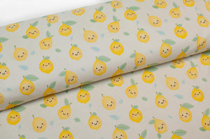 Tissu en ligne Québec jersey de coton lycra motif de citron kawaii. Online Canadian fabric store cotton spandex jersey knit with kawaii lemon.