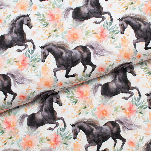 Tissu en ligne Québec jersey de coton lycra motif de cheval noir et de fleurs. Online Canadian fabric store cotton spandex jersey knit with horse and flowers.