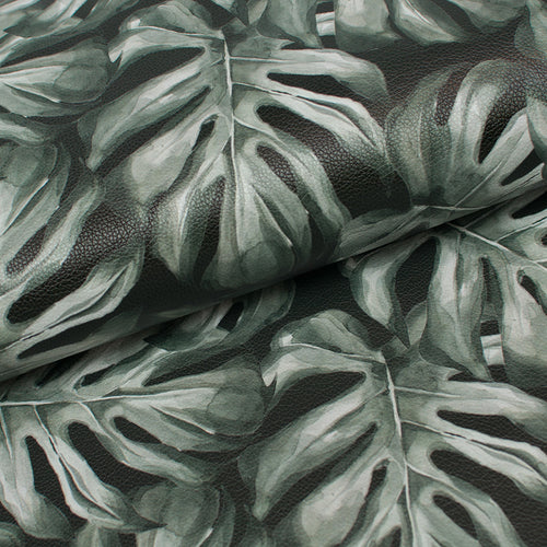 Tissu en ligne Québec similicuir, faux cuir, cuirette avec motif de feuilles de plante monstera. Online fabric leather with monstera plant leaf.