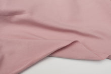 Tissu en ligne jersey de coton couleur uni rose. Online fabric cotton jersey solid pink color.