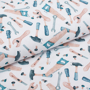 Tissu en ligne jersey de coton motif d'outils. Online fabric cotton jersey knit with tools.