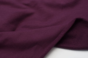 Tissu en ligne french terry de coton couleur mauve prune. Online fabric cotton french terry solid color.
