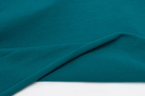 Tissu en ligne jersey de coton couleur uni bleu. Online fabric cotton jersey knit solid blue color.