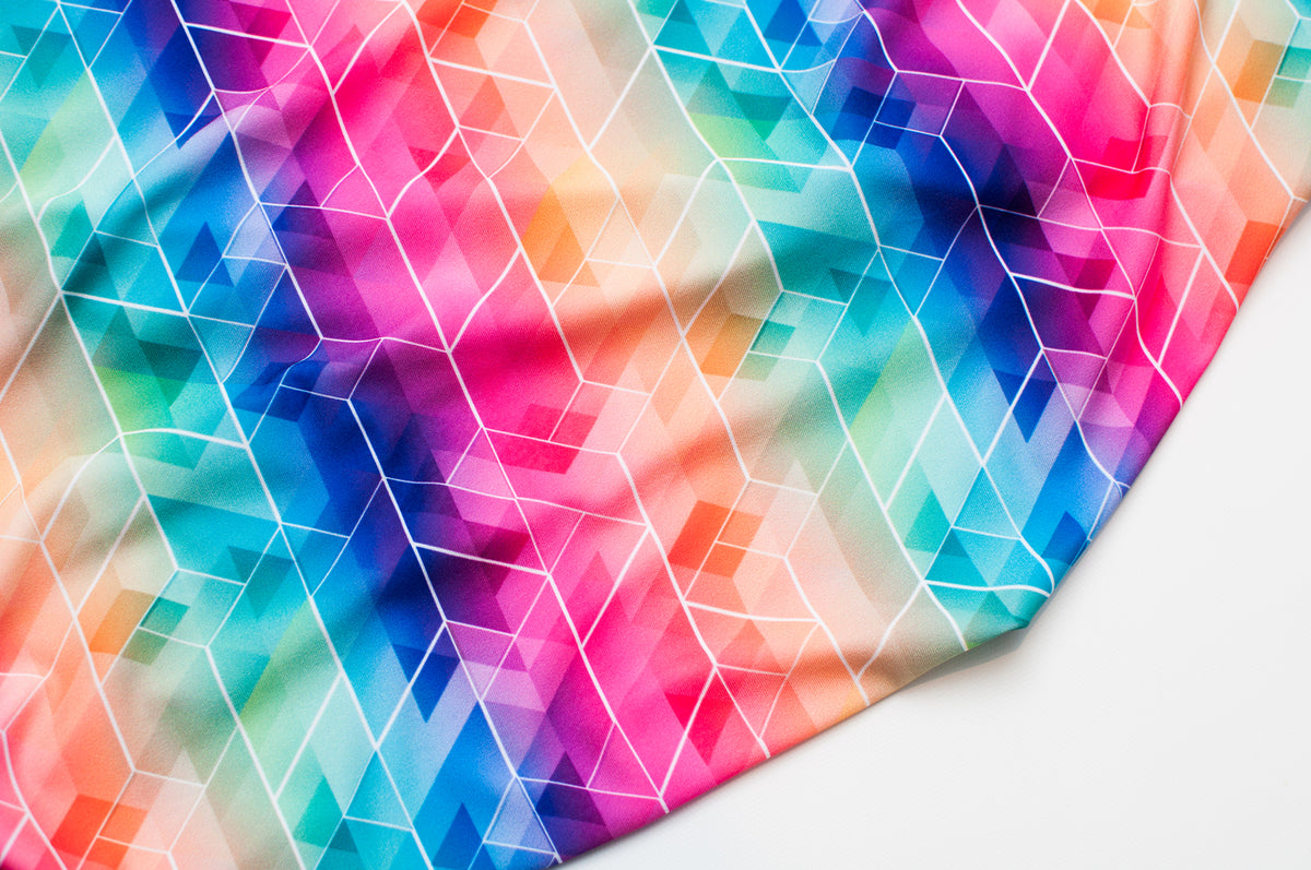 Athletic knit fabric with multicolored geometric pattern – Petite Pelure