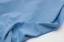 Tissu en ligne jersey de coton bleu. Online fabric blue cotton jersey.