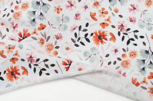 Tissu en ligne jersey de coton motif de feuillage et de fleurs. Online fabric cotton jersey knit with flowers and folliage..