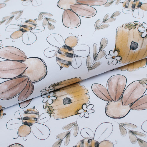 Tissu en ligne jersey de coton motif d'abeille et ruche de miel. Bee and honey cotton jersey online fabric.