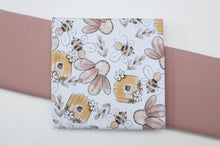 Tissu en ligne jersey de coton motif d'abeille et ruche de miel. Bee and honey cotton jersey online fabric.