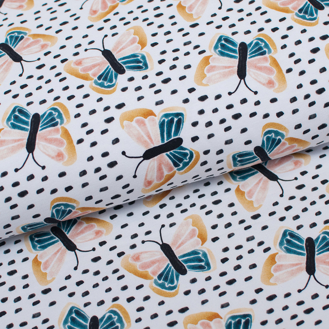 Tissu en ligne french terry de coton motif de papillons. Online fabric cotton french terry butterfly design.