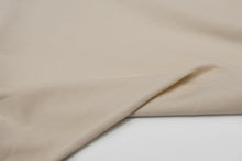 Tissu en ligne jersey de coton couleur uni. Online fabric solid cotton jersey.
