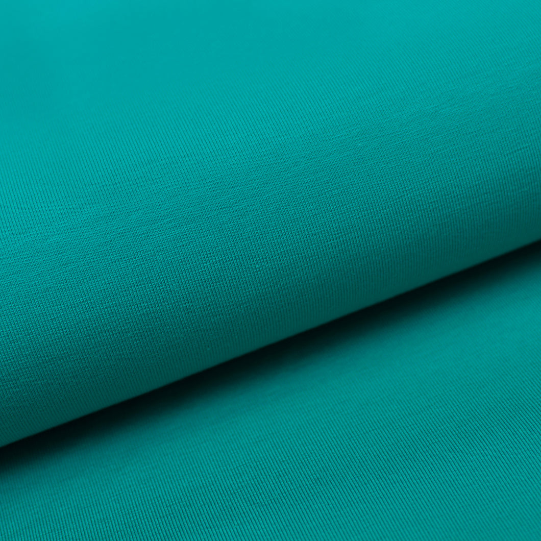 Tissu en ligne jersey de coton couleur émeraude. Online fabric solid color cotton jersey.