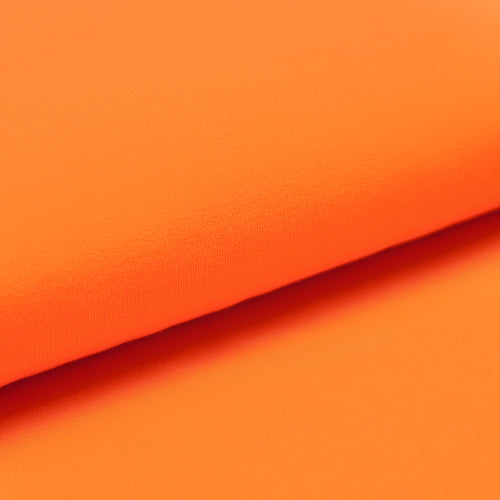 Tissu en ligne jersey de coton couleur uni orange. Online fabric cotton jersey orange solid color.