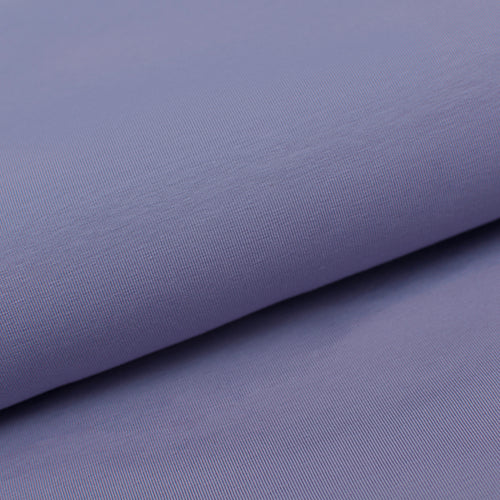 Tissu en ligne french terry de coton couleur mauve lilas. Online fabric cotton french terry solid color.