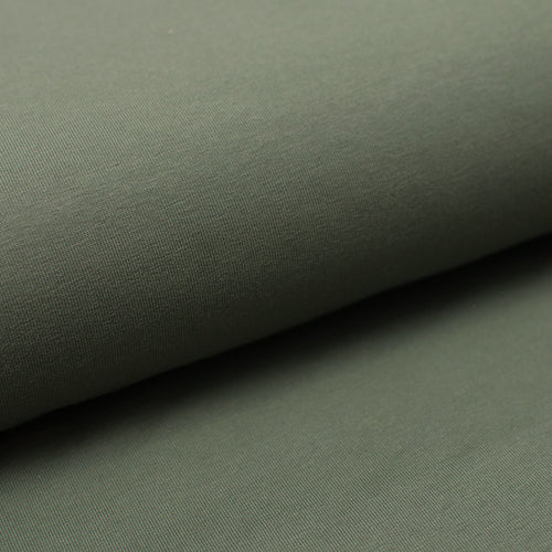 Tissu en ligne french terry de coton couleur vert kaki.  Online fabric cotton french terry solid color.